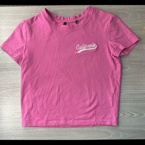 Super cute pink colored top. Says California and looks cute on anyone!